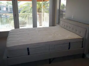 DreamCloud mattress on bed frame