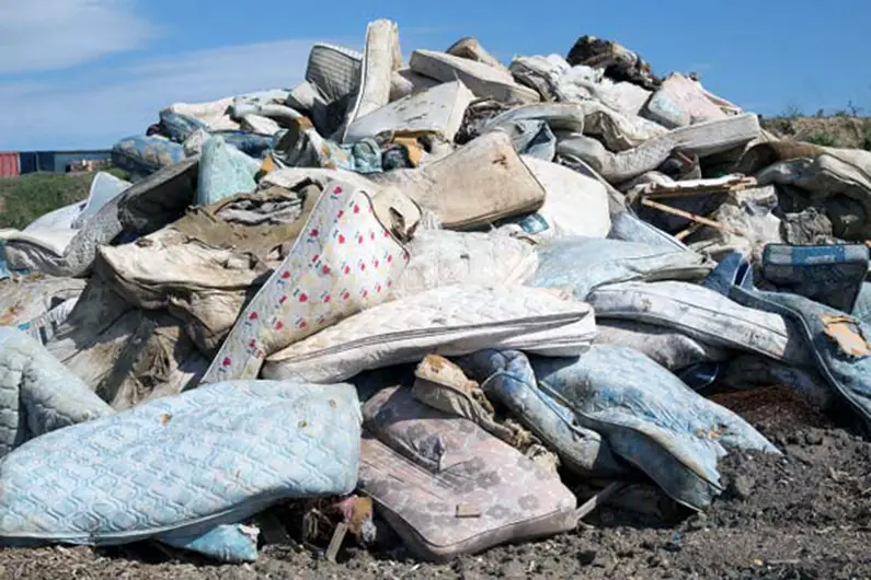 mattresses in a landfill